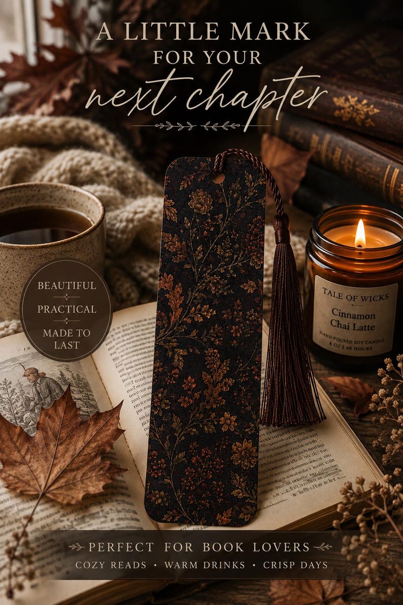 Moody autumn botanical bookmark with brown tassel featured in a cozy fall reading scene with vintage books, warm tea, glowing candle, knit blanket and autumn leaves, styled as a gift for book lovers.