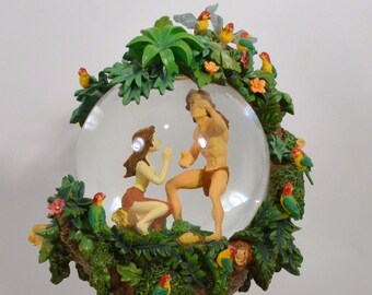 RARE Walt Disney Tarzan & Jane Blossoming Love Tree Two Worlds Phil Collins Musical Glitter Water Snowglobe