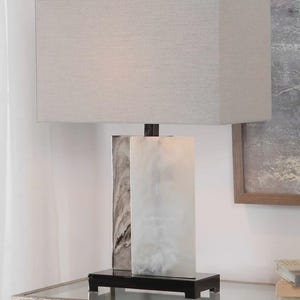 Vanda Table Lamp Modern Sculptural Design with Gray Linen Shade and Black Nickel Details