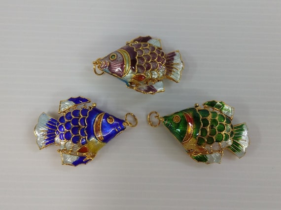 Articulated store cloisonne fish