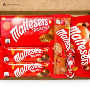 May include: A gift box filled with Maltesers chocolate. The box contains a bag of Maltesers, two Maltesers Teaser bars, and a packet of Maltesers Hot Chocolate.