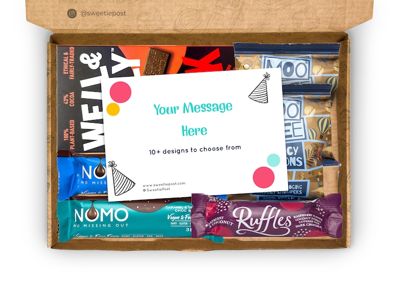 May include: A brown cardboard box with a variety of snacks inside. The box contains chocolate bars, granola bars, and a card with the text "Your Message Here" and a party hat graphic. The card also says "10+ designs to choose from".