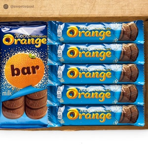 A SweetiePost Gift Box filled with Terry's chocolate orange, including the medium and individual bars. The A5 Terry's chocolate orange hamper by SweetiePost.