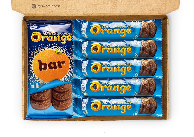 A SweetiePost Gift Box filled with Terry's chocolate orange, including the medium and individual bars. The A5 Terry's chocolate orange hamper by SweetiePost.