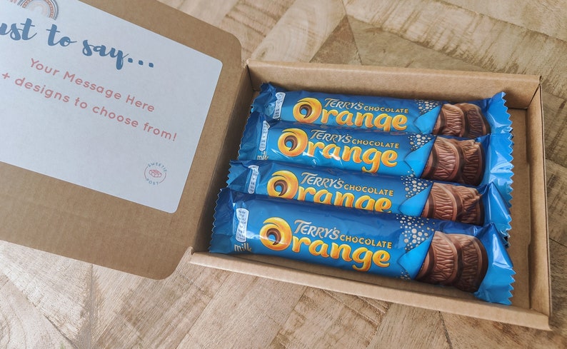 A SweetiePost Gift Box filled with Terry's chocolate orange. The A6Terry's chocolate orange hamper by SweetiePost.