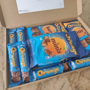 A SweetiePost Gift Box filled with Terry's chocolate orange, including Bars and Mini's. The A4 Terry's chocolate orange hamper by SweetiePost.