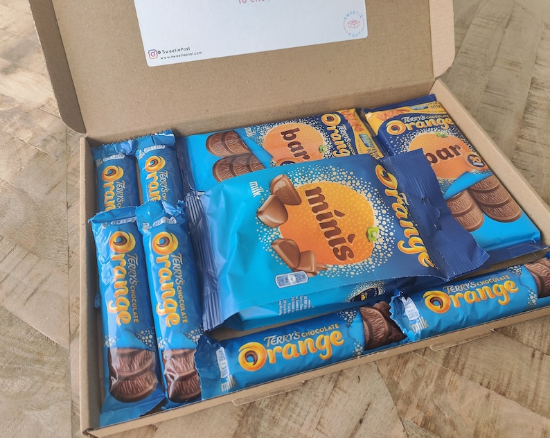 A SweetiePost Gift Box filled with Terry's chocolate orange, including Bars and Mini's. The A4 Terry's chocolate orange hamper by SweetiePost.