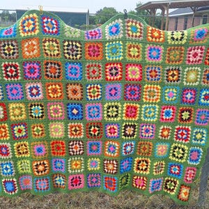 Green multi colored Granny Square crocheted Afghan