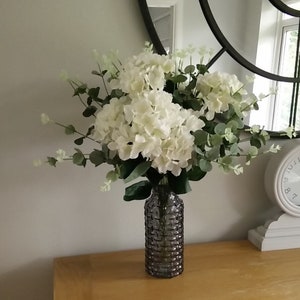 Artificial Flower Ivory Hydrangea and Eucalyptus Mix Arrangement in a Grey Glass Vase FREE POSTAGE