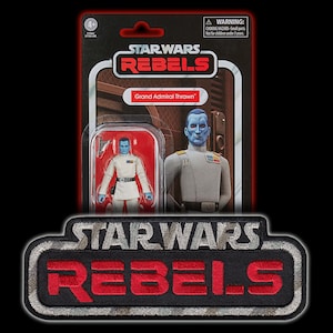 May include: A Star Wars Rebels action figure of Grand Admiral Thrawn in his white and grey uniform. The figure is packaged in a retro-style box with a red background and the Star Wars Rebels logo.