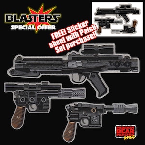 May include: A set of four embroidered Star Wars blaster patches, including a DL-44 blaster, a BlasTech E-11 blaster, a SE-14r blaster pistol, and a BlasTech DL-18 blaster pistol. The patches are black and grey with brown accents. The patches are part of a special offer that includes a free sticker sheet with a patch set purchase.