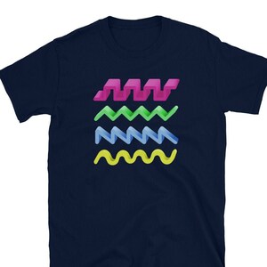 May include: A navy blue t-shirt with a graphic design of four wavy lines in pink, green, blue, and yellow.