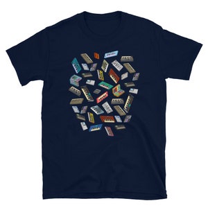 May include: A navy blue t-shirt featuring a colourful pattern of vintage synthesizers and keyboards.