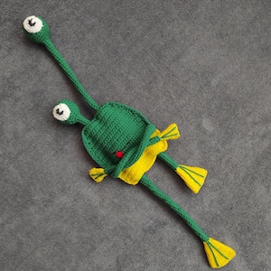 Antistress frog is crocheted.  Crazy Frog - elastic, rubber band.  Funny toy for children and adults.