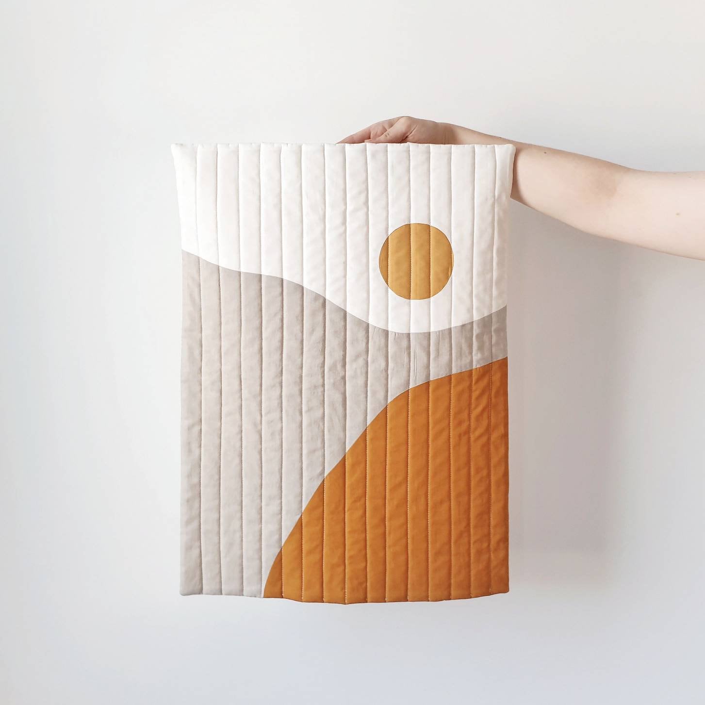 Sunrise quilted wall hanging. Modern fabric wall hanging. Etsy