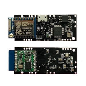 Puede incluir: Dos placas de circuito impreso negras con varios componentes electrónicos. Una placa tiene un módulo azul con "Wi Fi" y "ESP8266MOD" impreso. La otra placa tiene un módulo verde. Las placas rectangulares tienen múltiples puntos de conexión.