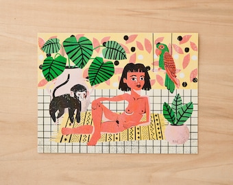 May include: A rectangular art print featuring a stylized illustration of a person reclining on a yellow patterned rug. The scene includes a black monkey, a green parrot, and two potted plants against a yellow background with a white grid floor.
