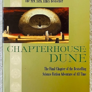 May include: A set of three ceramic mugs with a speckled, matte finish. The mugs are in shades of cream, light gray, and dark gray. Each mug has a simple, minimalist design and a rounded handle.