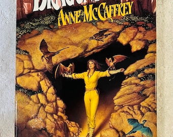 ANNE MCCAFFREY - L'aube du dragon - 1988 Relié en dj