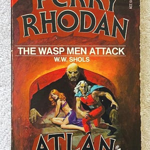 May include: A vintage paperback book titled "Perry Rhodan" with the subtitle "The Wasp Men Attack." The cover features a dramatic illustration of figures in a sci-fi setting. The book is a special release with two complete novels.