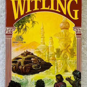 May include: A paperback book cover for "The Witling" by Vernor Vinge. The cover features a yellow background with a futuristic city and a flying craft. The title is in large yellow letters.