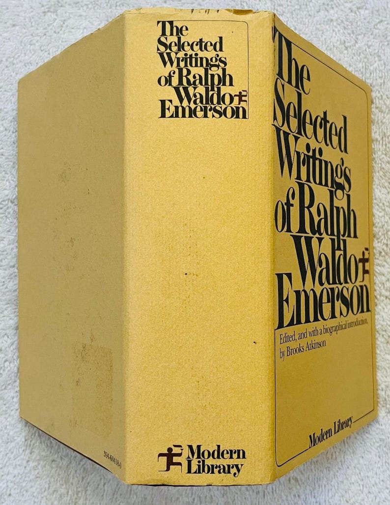 May include: A mustard-yellow hardback book with the title "The Selected Writings of Ralph Waldo Emerson" in black lettering. The book is part of the Modern Library series and includes a biographical introduction.