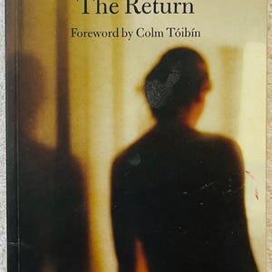 May include: A book cover for "The Return" by Joseph Conrad, with a foreword by Colm Tóibín. The cover features a blurred silhouette of a person against a warm, sepia-toned background. The title and author's name are in a classic serif font.