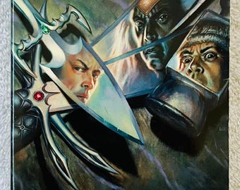 May include: A book cover for "The Silent Blade" by R.A. Salvatore, part of the "Forgotten Realms" series. The cover features illustrations of three characters and a large silver sword. The text "The New York Times Best-Selling Saga Continues!" is at the top.