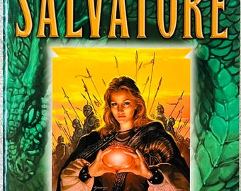 May include: A paperback book titled Immortalis by R.A. Salvatore, featuring a green dragon scale background. The cover art depicts a figure in armor holding a glowing orange orb against a sunset sky with soldiers and spears in the background.