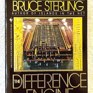 Puede incluir: Portada del libro "The Difference Engine" de William Gibson y Bruce Sterling. La portada es oscura con letras doradas y una ilustración detallada de una máquina. Edición especial Spectra.