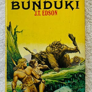 J. T. EDSON - Bunduki - 1976 Första tryckningen Daw Pocketbok - Tarzan-pastisch