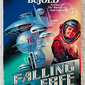 May include: A vintage paperback book cover with the title "FALLING FREE" in large white letters. The cover features a futuristic spaceship design, a person in a spacesuit, and the author's name, Lois McMaster Bujold.