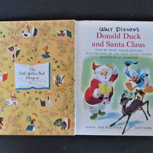 May include: A vintage Little Golden Book featuring Donald Duck and Santa Claus. The cover shows Donald Duck in a blue shirt and Santa Claus in a red suit. The book is titled "Walt Disney's Donald Duck and Santa Claus".