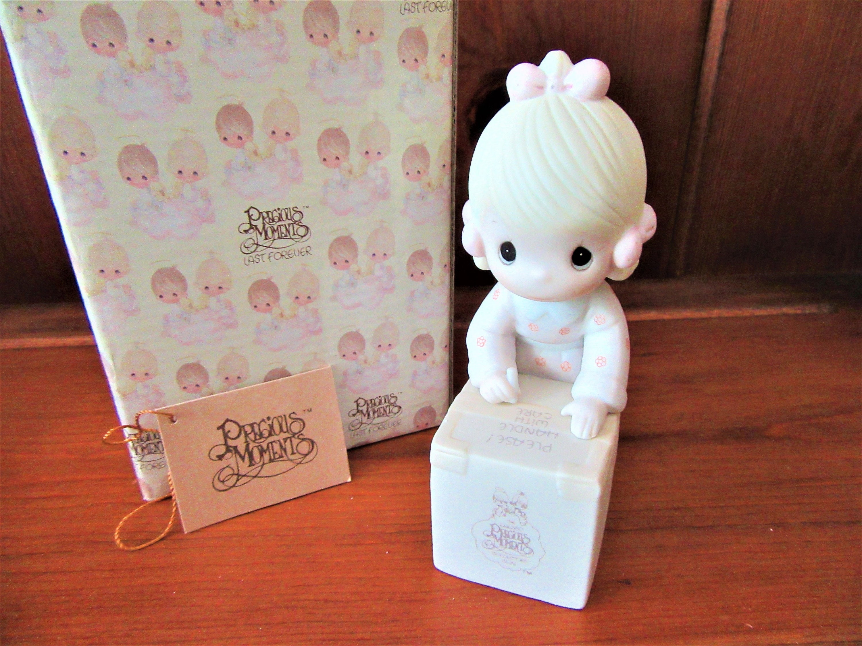 Vintage 1987 Precious Moments Figurine: Sharing is Universal