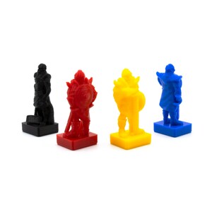 May include: Four miniature plastic figures, each standing on a square base. The figures are painted in different colors: black, red, yellow, and blue. Each figure is wearing armor and holding a weapon.