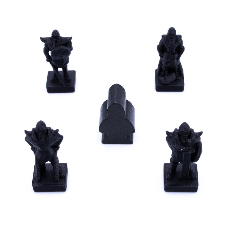 May include: Four black plastic game pieces, three are figures of warriors with swords and shields, and one is a simple shape. The pieces are on a white background.
