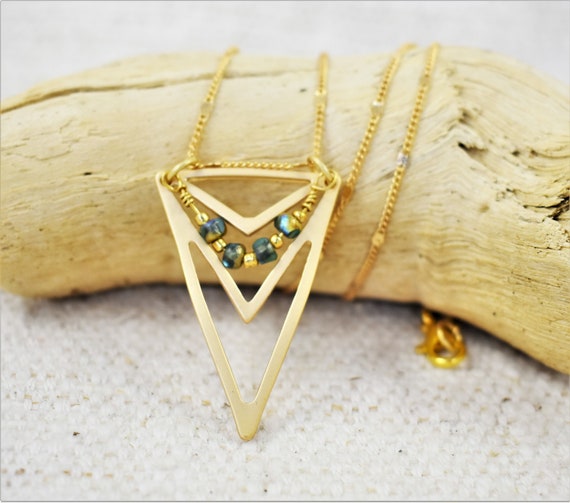 Gold necklace with triangle best sale pendant