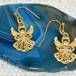 Earrings - Gold Angel Earrings drop 22 mm from 18K gold plated ear wires. These little angels are cute and matte gold. Beautiful gift for Christmas or for any season. Jewelry gift for her. Religious gift
