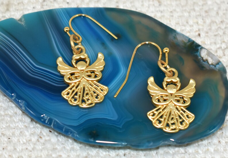 Earrings - Gold Angel Earrings drop 22 mm from 18K gold plated ear wires. These little angels are cute and matte gold. Beautiful gift for Christmas or for any season. Jewelry gift for her. Religious gift