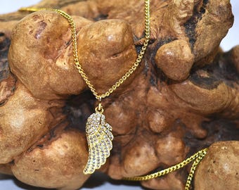 Gold Wing Pendant Necklace With Micro Pave Crystals on Gold Curb Chain