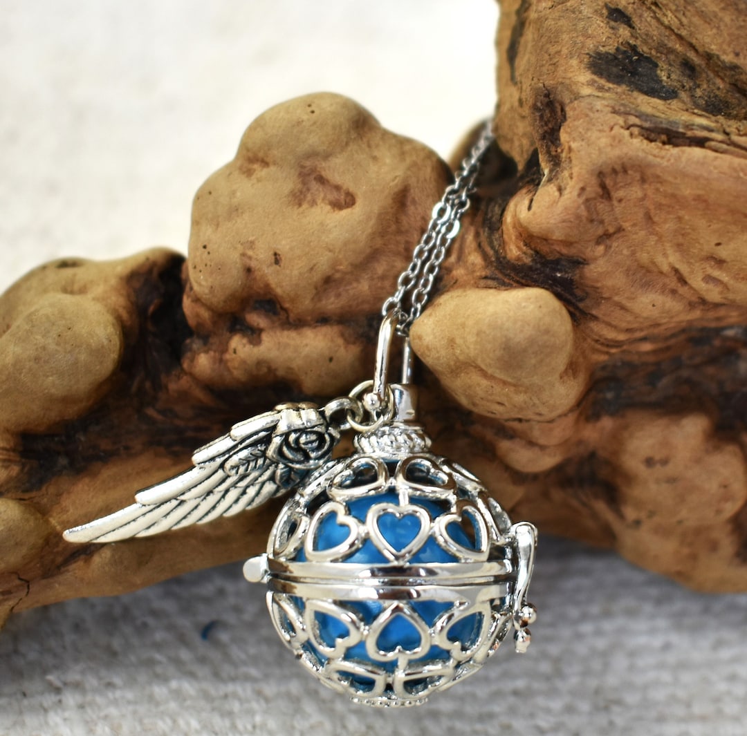 Silver Angel Caller Bola Necklace: Heart Cut-outs, Wing Charm
