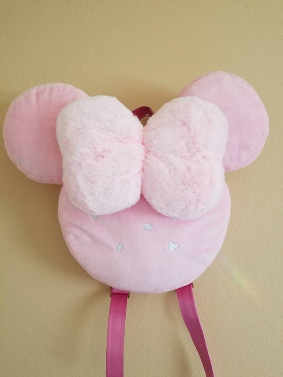 pink fluffy backpack