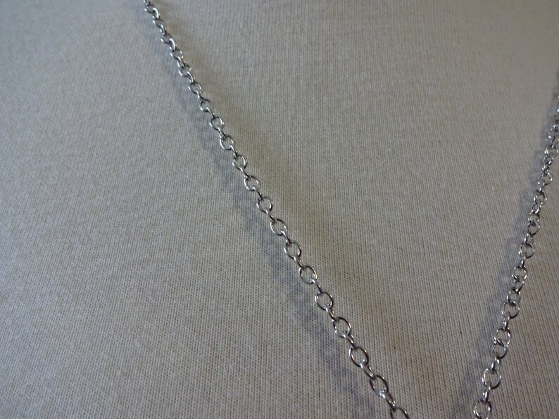 Long necklace with Hamsa pendant
