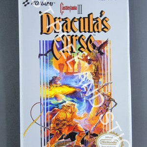 May include: A vintage video game cartridge for the Nintendo Entertainment System. The game is Castlevania III: Dracula's Curse, published by Konami. The cartridge is white with a colourful label featuring a knight fighting a dragon and a skeleton. The label also includes the game title, the publisher's logo, and the Nintendo Seal of Quality.