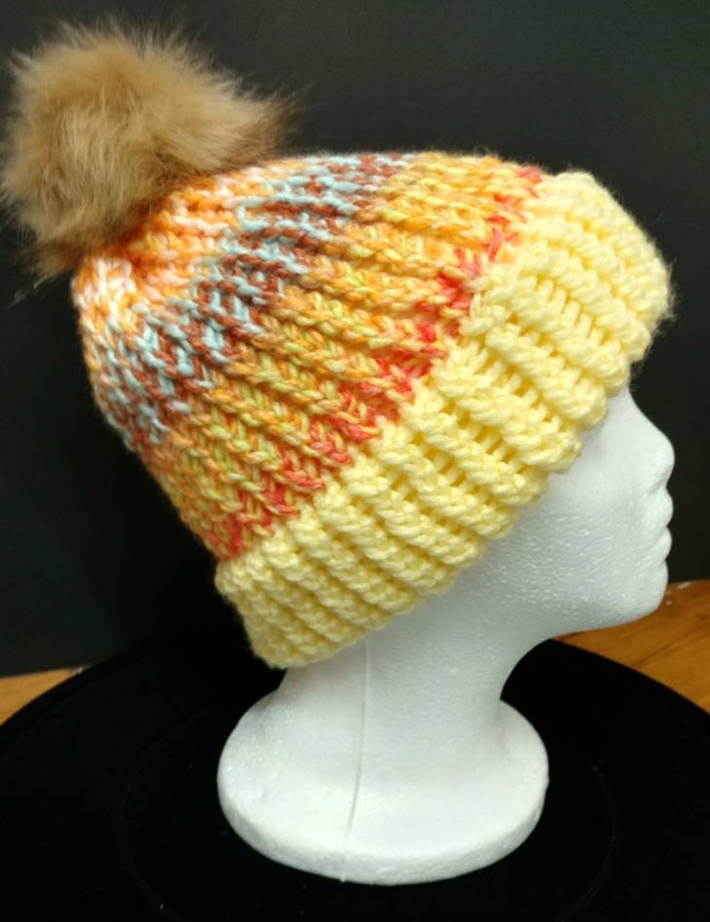 can be worn by adults or young adults Lightweight winter cap with built in brim and removabledetachable pom Great gift 20 circumference