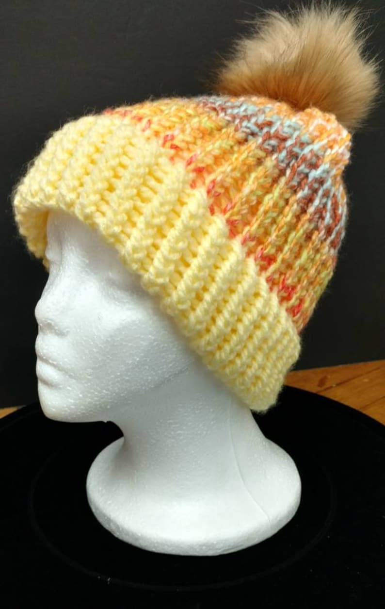 can be worn by adults or young adults Lightweight winter cap with built in brim and removabledetachable pom Great gift 20 circumference