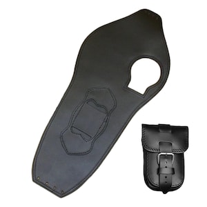 Peut inclure: Un protège-réservoir de moto en cuir noir avec un motif cousu et une petite pochette en cuir noir avec une fermeture à boucle. Le protège-réservoir a une découpe pour le bouchon d'essence.