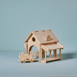 Wooden toy station with train