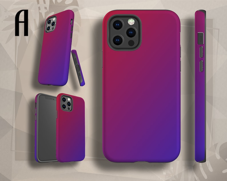 May include: A phone case with a gradient design that transitions from pink to purple. The case has a raised camera bump and a cutout for the phone's buttons.