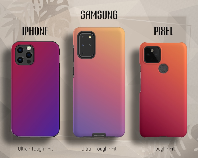 May include: Three phone cases with gradient color designs. The case on the left is purple to pink, the middle case is purple to orange, and the case on the right is orange to red. The cases are labeled "IPHONE", "SAMSUNG", and "PIXEL".